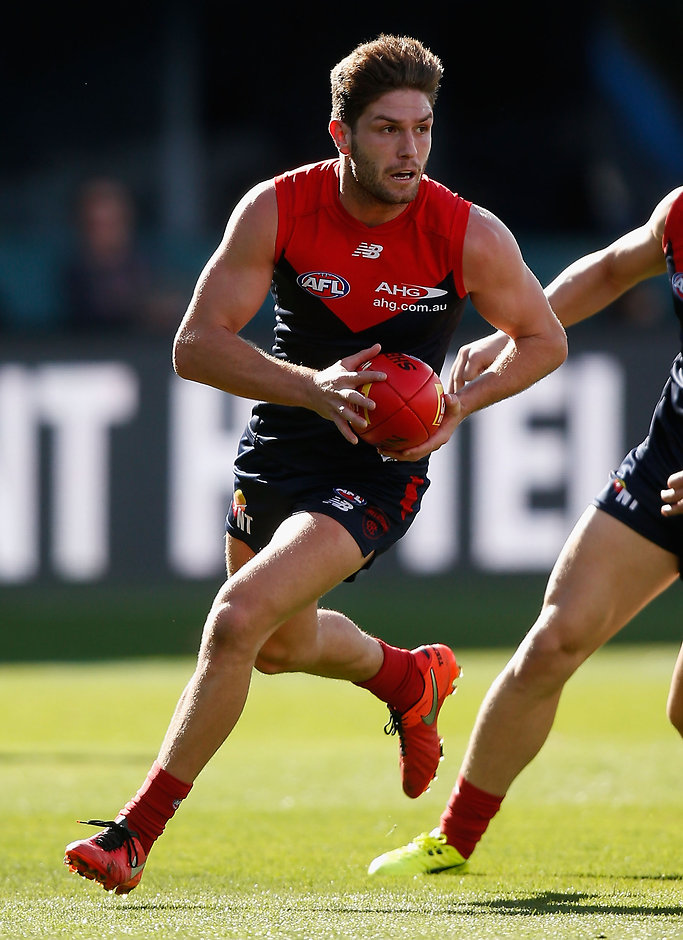 AFL 2016 Rd 03 - North Melbourne v Melbourne HOBART, AUSTRALIA - APRIL 10: Tomas Bugg of the Demons in action during the 2016 AFL Round 03 match between the North Melbourne Kangaroos and the Melbourne Demons at Blundstone Arena, Hobart on April 10, 2016. (Photo by Sean Garnsworthy/AFL Media)